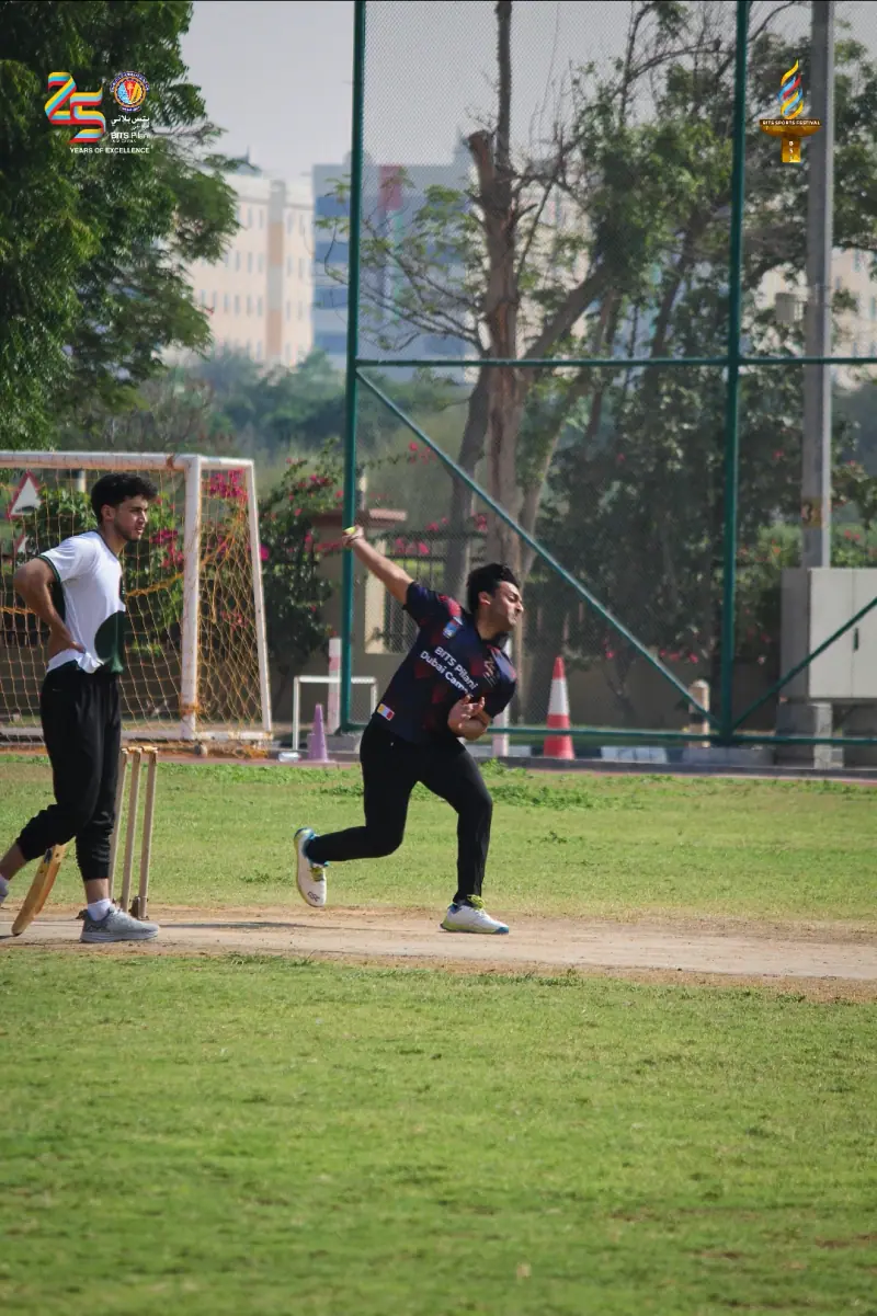 A bowler in his delivery stride