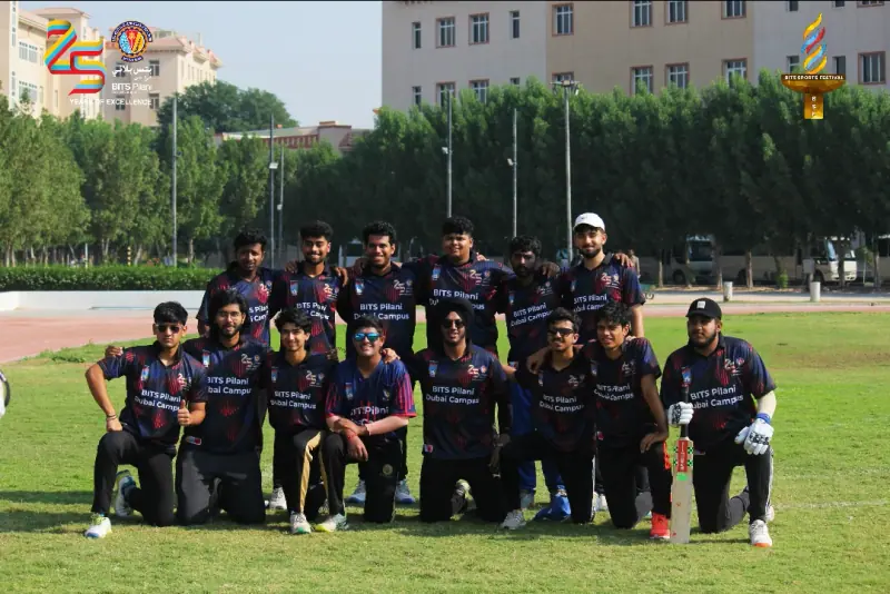 A cricket team lined up on the field