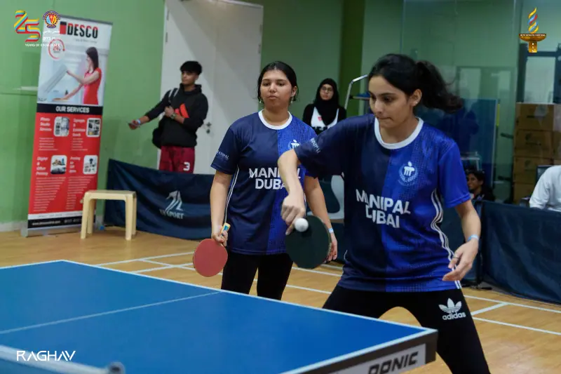 A girls table tennis match